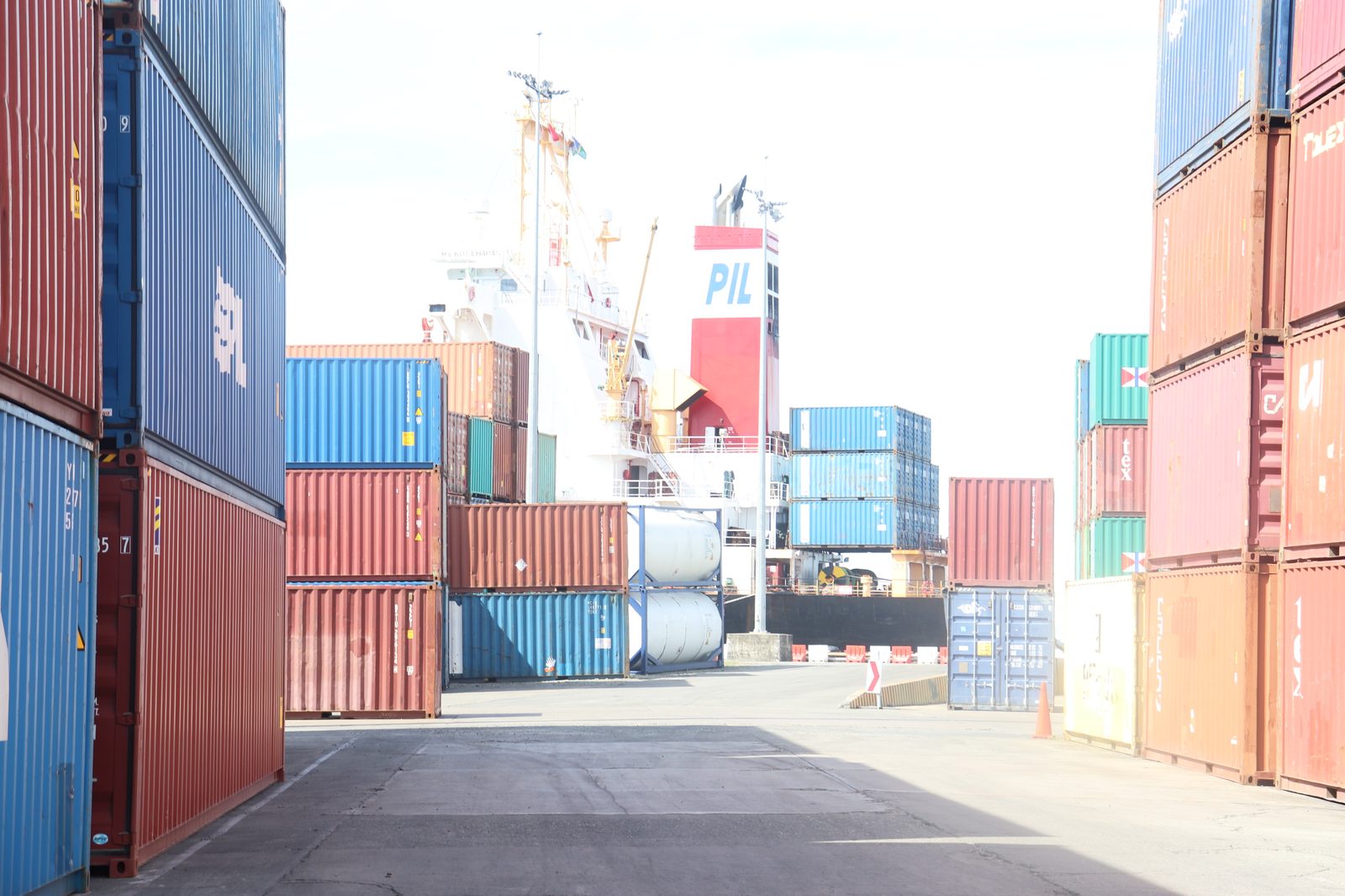 Rows of shipping containers stacked at Honiara port